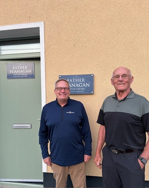 Photograph of Tom and Dan outside the Visitor Centre.